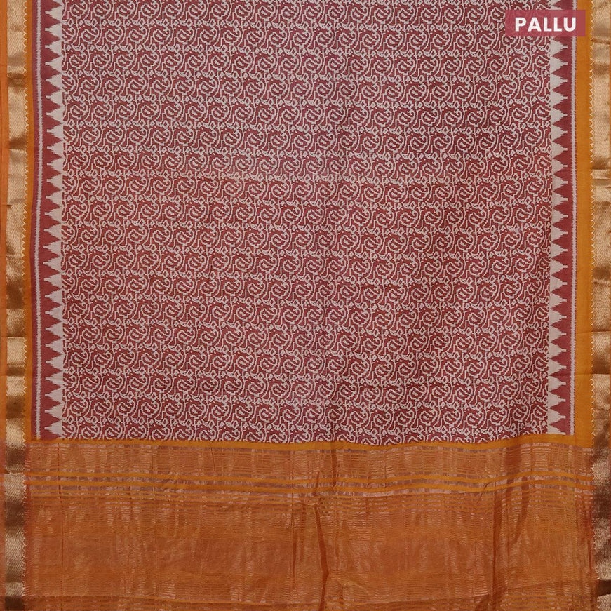 Semi gadwal saree pastel maroon and mustard yellow with allover paisley prints and zari woven border