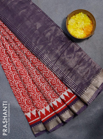 Semi gadwal saree red and jamun shade with allover paisley prints and zari woven border