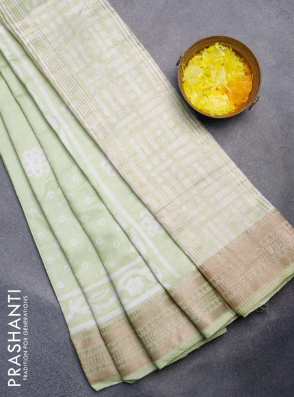 Semi gadwal saree pista green with geometric butta prints and zari woven border