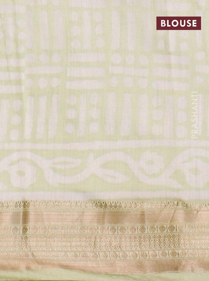 Semi gadwal saree pista green with geometric butta prints and zari woven border