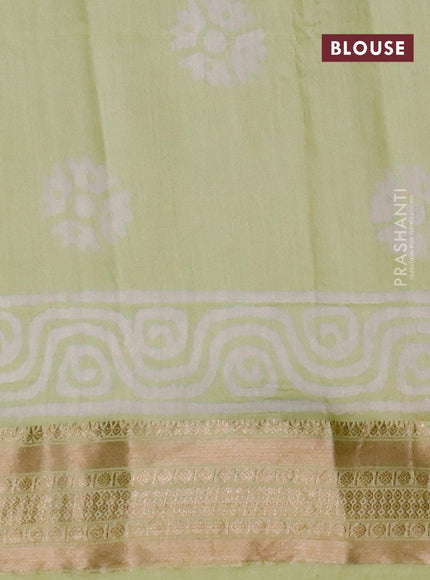 Semi gadwal saree pista green with allover prints and zari woven border