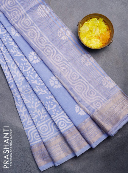 Semi gadwal saree blue shade with allover prints and zari woven border