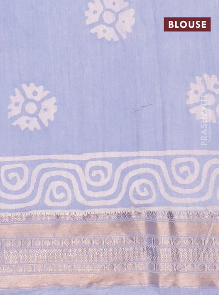 Semi gadwal saree blue shade with allover prints and zari woven border