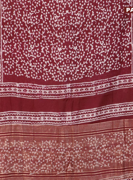 Semi gadwal saree deep maroon with allover batik prints and zari woven border