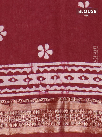 Semi gadwal saree deep maroon with allover batik prints and zari woven border