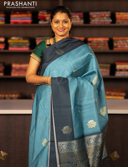 Semi tussar saree blue shade and peacock blue with zari woven buttas and simple border