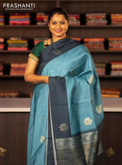 Semi tussar saree blue shade and peacock blue with zari woven buttas and simple border