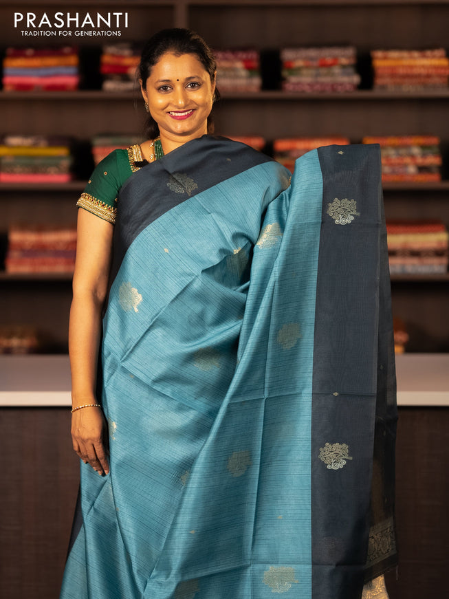 Semi tussar saree blue shade and peacock blue with zari woven buttas and simple border