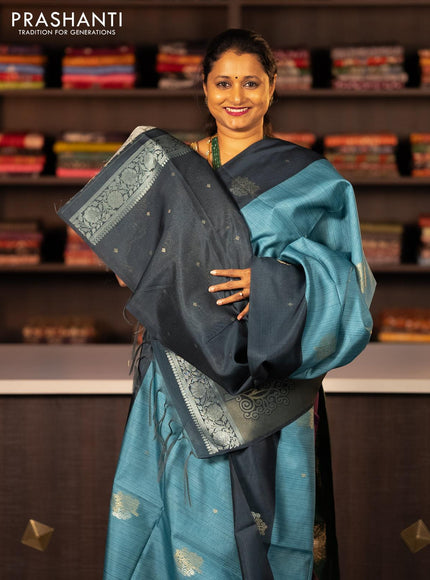 Semi tussar saree blue shade and peacock blue with zari woven buttas and simple border