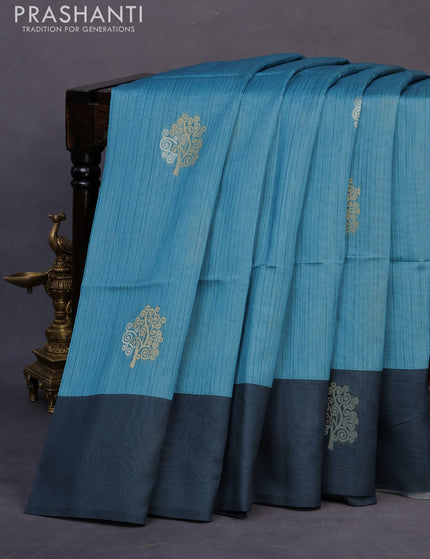 Semi tussar saree blue shade and peacock blue with zari woven buttas and simple border