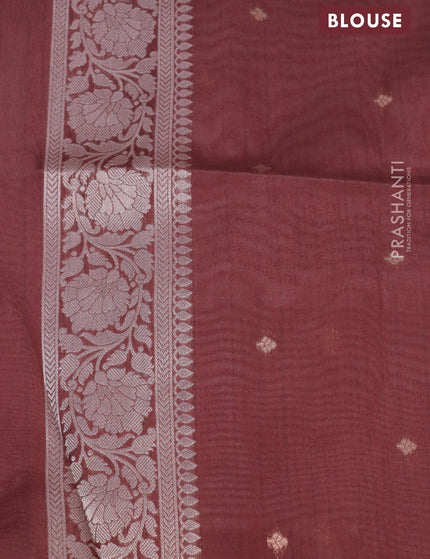 Semi tussar saree peach orange and rust shade with zari woven buttas and simple border