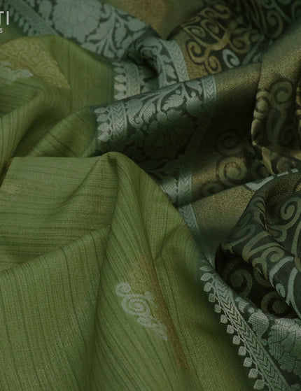 Semi tussar saree green shade and sap green with zari woven buttas and simple border