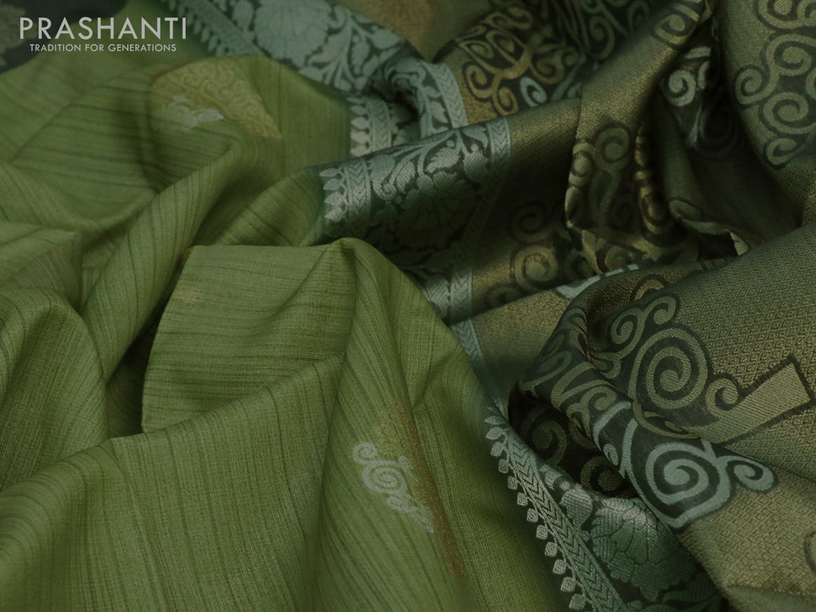 Semi tussar saree green shade and sap green with zari woven buttas and simple border