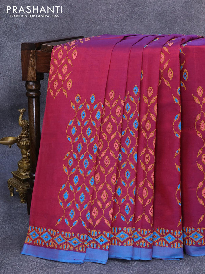 Silk cotton block printed saree dual shade of maroon and blue with allover butta prints and printed border