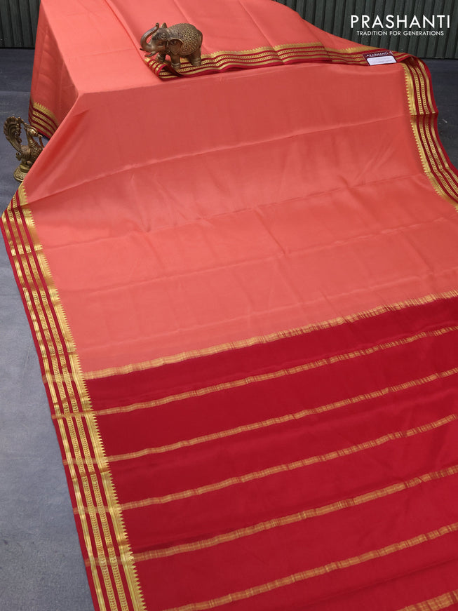 Mysore silk saree peach orange and maroon with plain body and zari woven border plain body