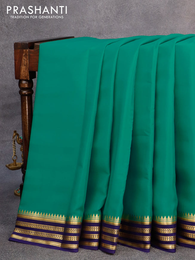 Mysore silk saree teal green and blue with plain body and zari woven border plain body