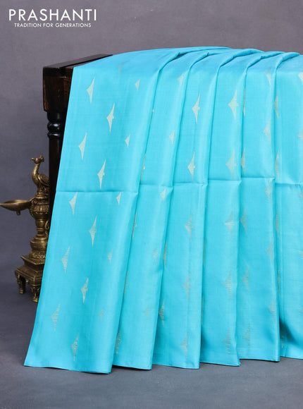 Pure soft silk saree light blue and green with allover zari woven buttas in borderless style - borderless style