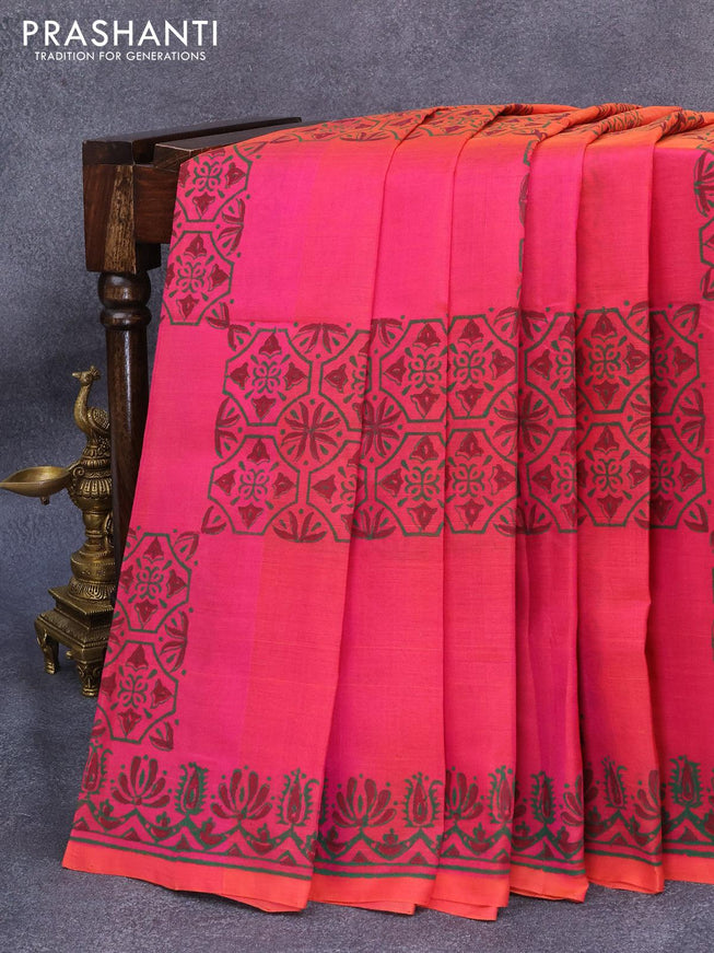 Silk cotton block printed saree dual shade of pink and orange with butta prints and piping border