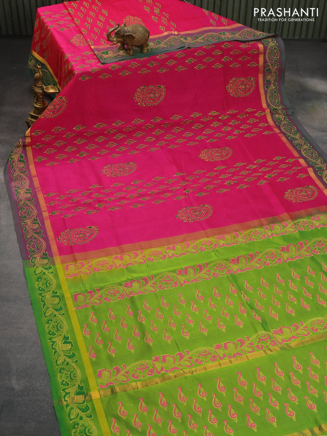 Silk cotton block printed saree pink and light green with allover butta printa and zari woven printed border