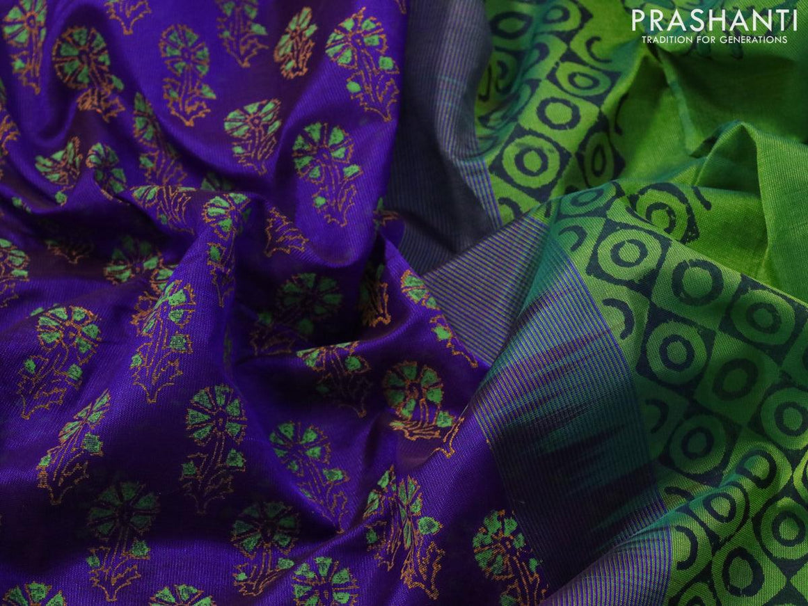 Silk cotton block printed saree blue and green with allover floral butta prints and zari woven printed border