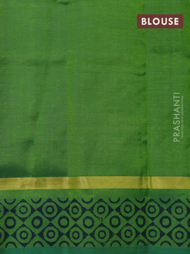 Silk cotton block printed saree blue and green with allover floral butta prints and zari woven printed border