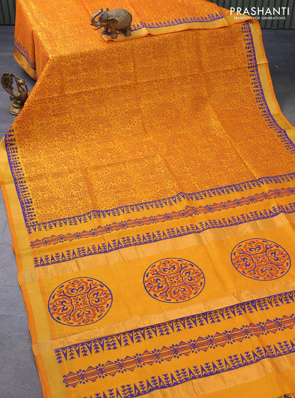 Silk cotton block printed saree mustard yellow with allover prints and zari woven border