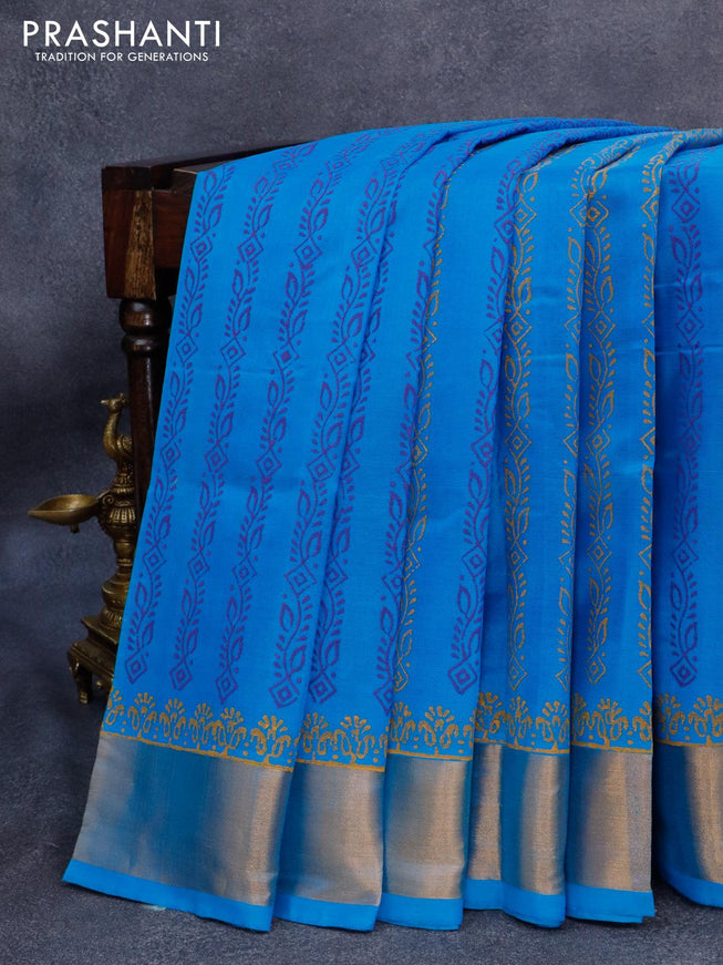 Silk cotton block printed saree cs blue with allover prints and zari woven border