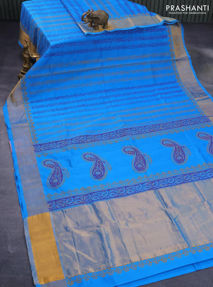 Silk cotton block printed saree cs blue with allover prints and zari woven border