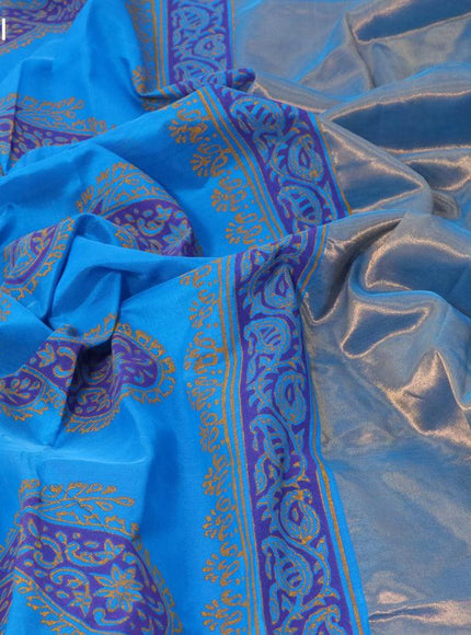 Silk cotton block printed saree cs blue with allover prints and zari woven border