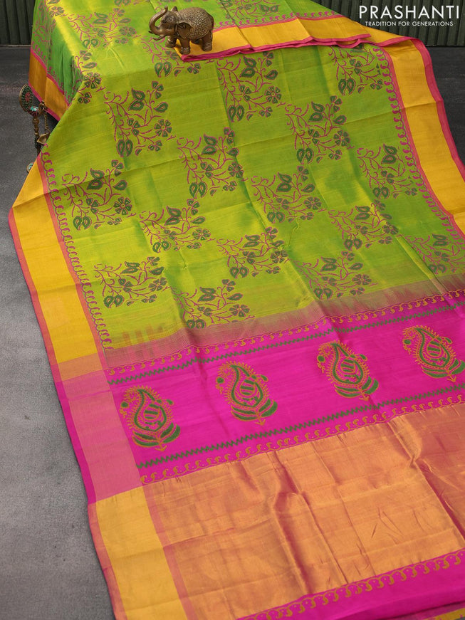 Silk cotton block printed saree light green and pink with allover prints and zari woven border