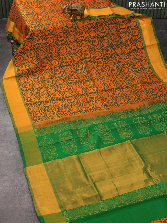 Silk cotton block printed saree orange and green with allover prints and zari woven border