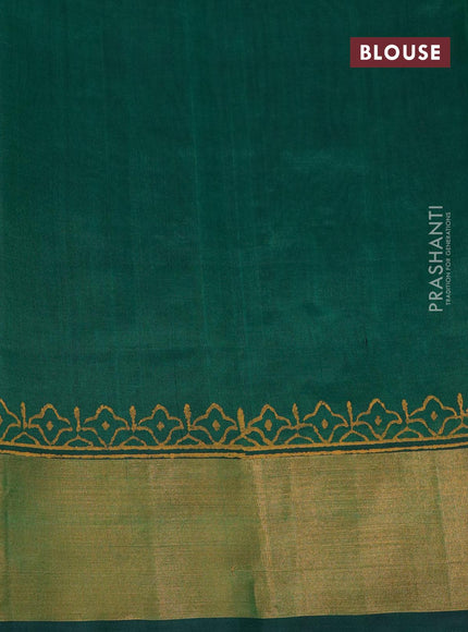 Silk cotton block printed saree green with allover prints and zari woven border