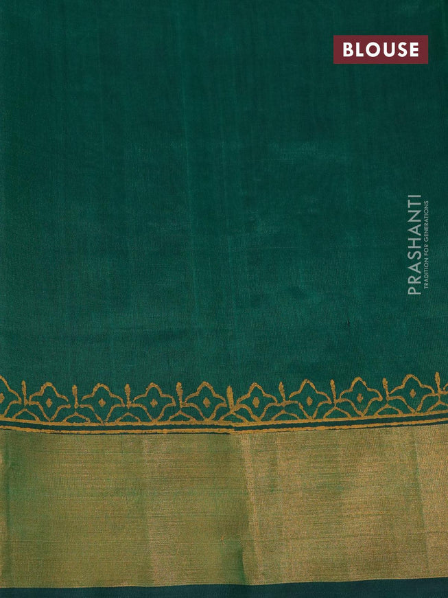 Silk cotton block printed saree green with allover prints and zari woven border