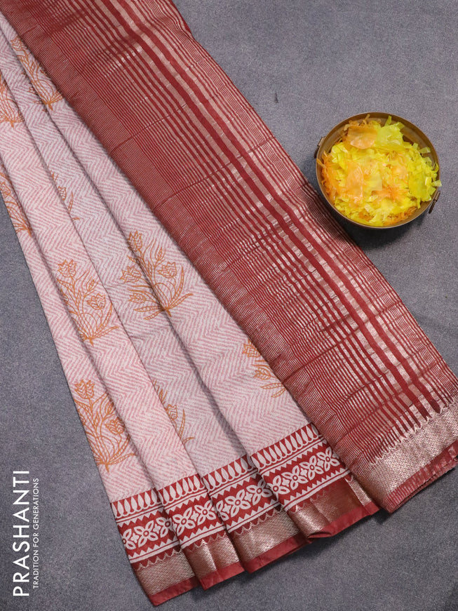 Semi gadwal saree off white pastel shade and maroon shade with allover prints and zari woven border