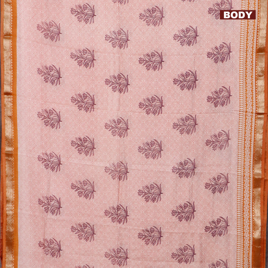 Semi gadwal saree off white pastel shade and dark mustard with allover prints and zari woven border