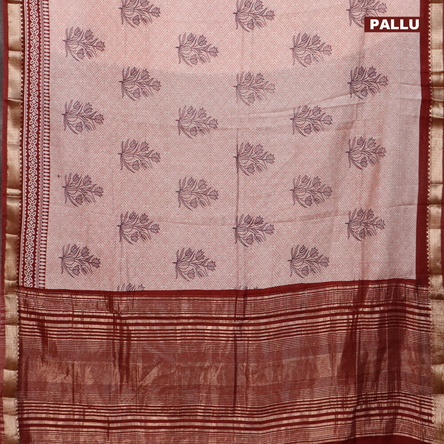 Semi gadwal saree off white pastel shade and maroon with allover prints and zari woven border