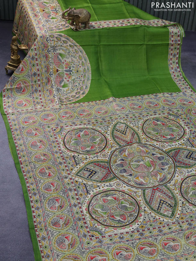 Madhubani printed silk saree light green and cream with allover prints and printed border