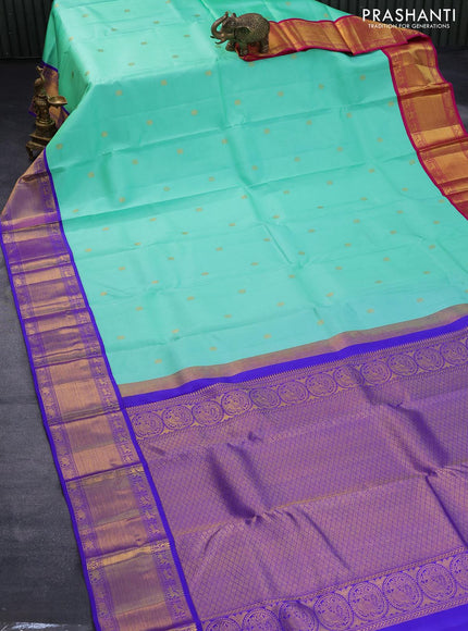 Pure kanjivaram silk saree teal green shade with annam & rudhraksha zari woven buttas and rich zari woven ganga jamuna border butta style