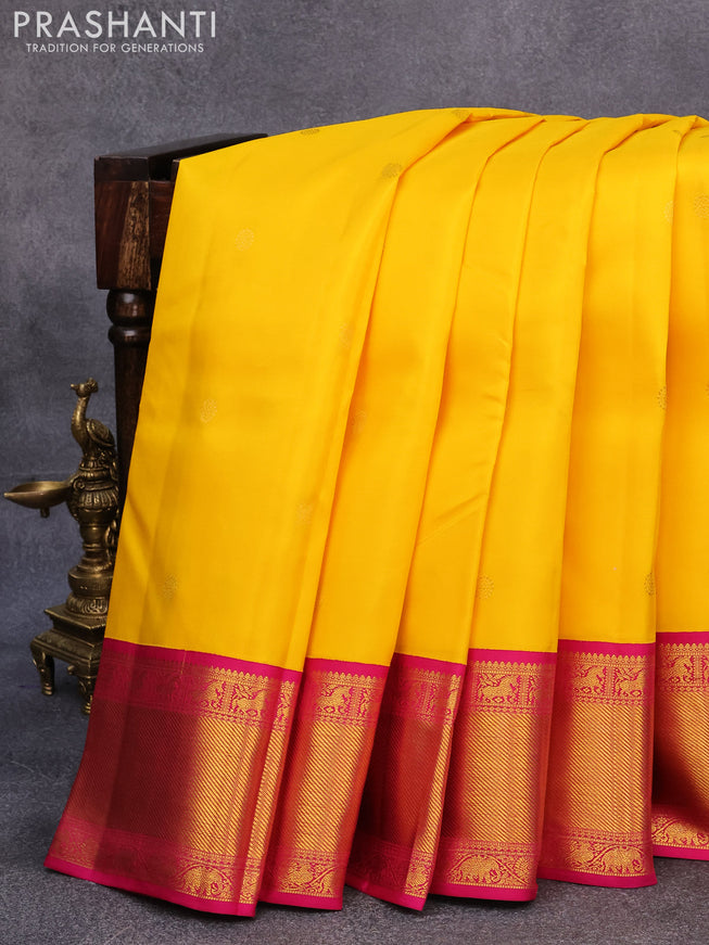 Pure kanjivaram silk saree mango yellow with annam & rudhraksha zari woven buttas and rich zari woven ganga jamuna border butta style