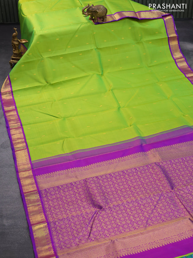 Pure kanjivaram silk saree light green and dual shade of purple with zari woven buttas and rich zari woven border butta style