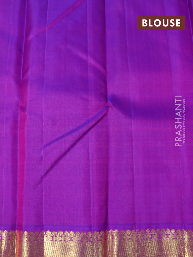 Pure kanjivaram silk saree light green and dual shade of purple with zari woven buttas and rich zari woven border butta style