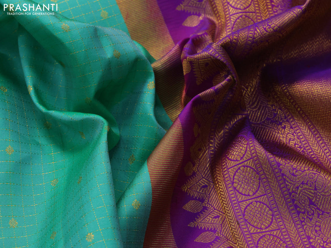 Pure kanjivaram silk saree teal green and dual shade of purple with allover zari checks & buttas and annam & elephnant zari woven border checks