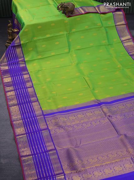 Pure kanjivaram silk saree light green and blue with allover zari woven annam buttas and long rich zari woven korvai border butta style