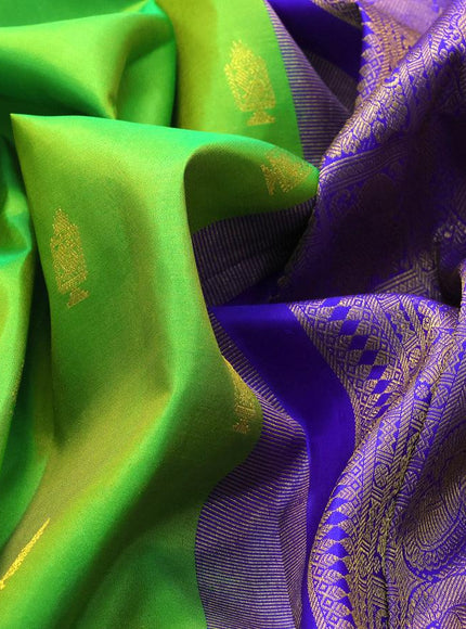 Pure kanjivaram silk saree light green and blue with allover zari woven annam buttas and long rich zari woven korvai border butta style