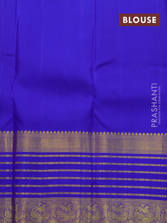 Pure kanjivaram silk saree light green and blue with allover zari woven annam buttas and long rich zari woven korvai border butta style