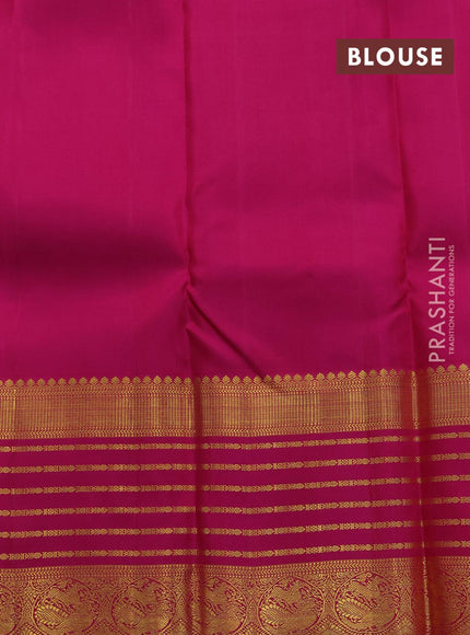 Pure kanjivaram silk saree dual shade of teal bluish green and pink with allover zari woven annam buttas and long rich zari woven korvai border butta style