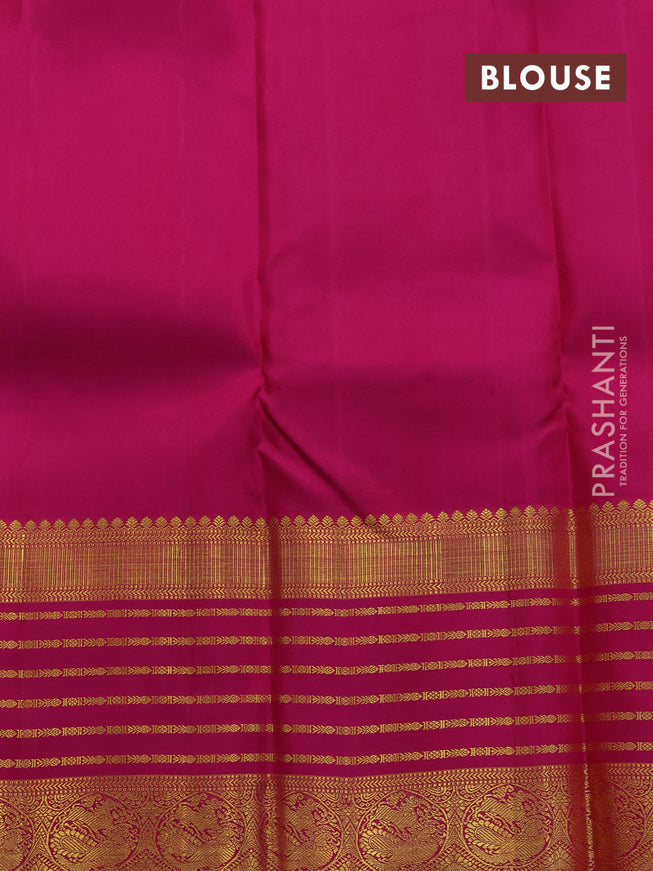Pure kanjivaram silk saree dual shade of teal bluish green and pink with allover zari woven annam buttas and long rich zari woven korvai border butta style