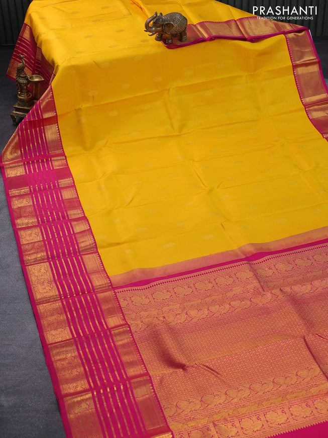 Pure kanjivaram silk saree mango yellow and pink with allover zari woven annam buttas and long rich zari woven korvai border butta style