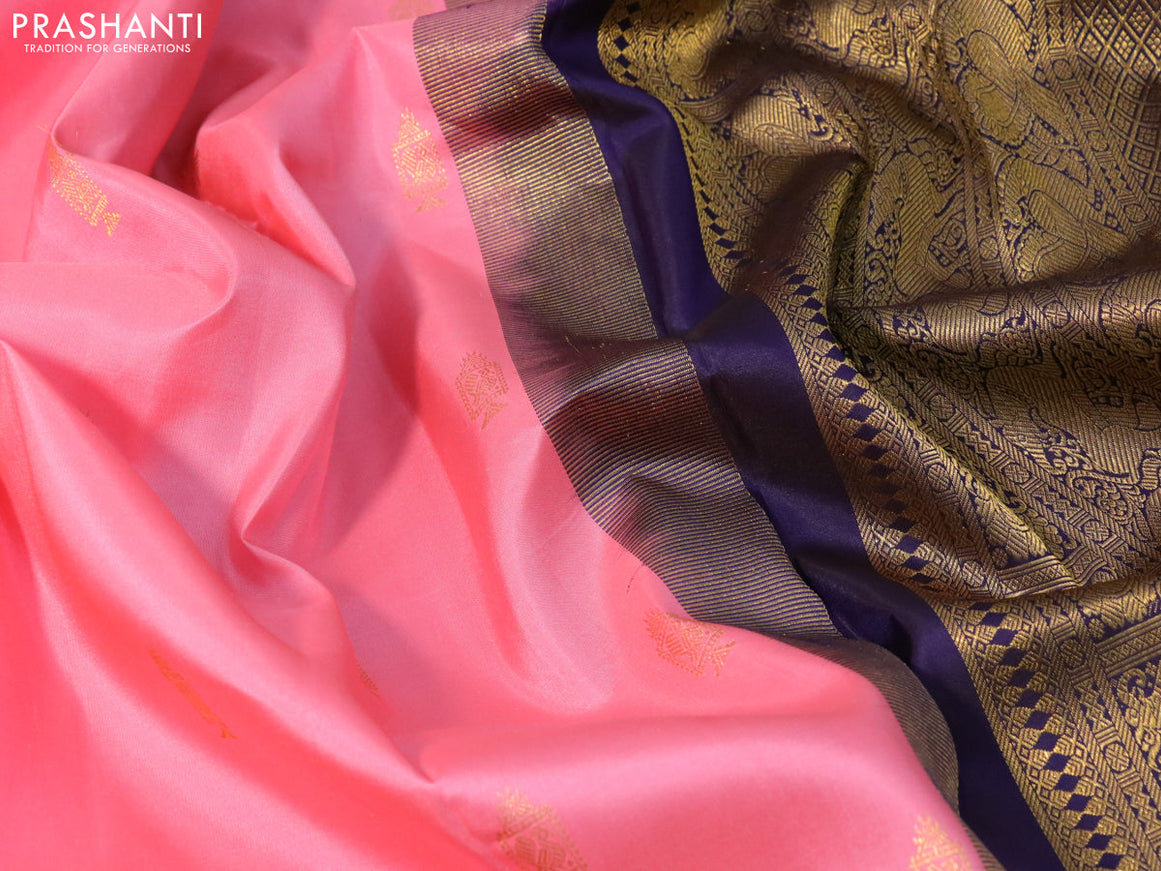 Pure kanjivaram silk saree light pink and navy blue with allover zari woven annam buttas and long rich zari woven korvai border butta style