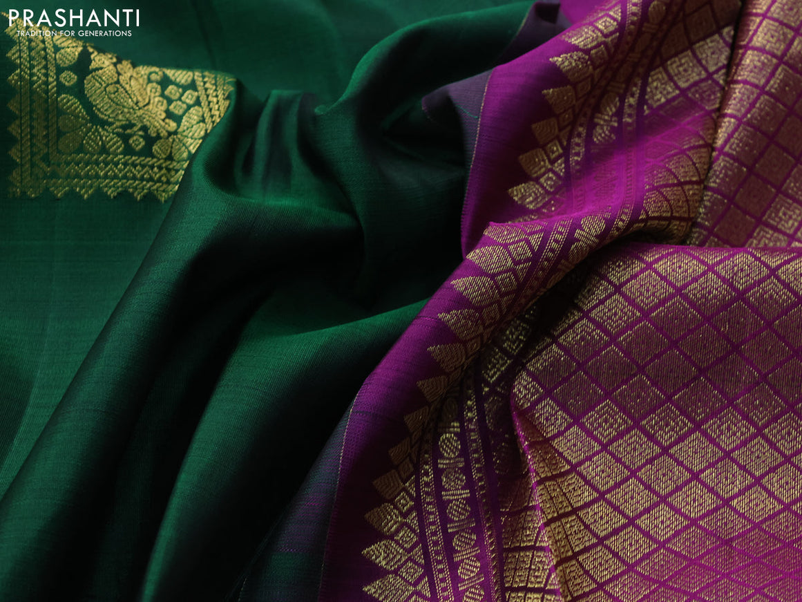 Pure kanjivaram silk saree dark green and purple with annam zari woven buttas and zari woven floral border butta style